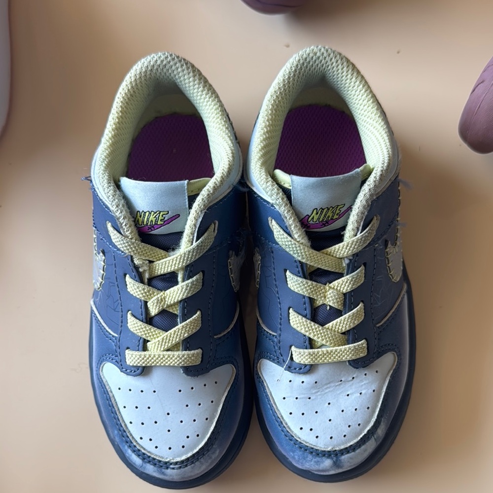 Nike Blue and White Sneakers with Low-Top Design